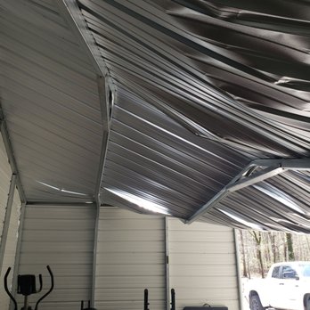 Gemco Building Systems - Metal roof put on sideways! No bracing at all. Only thing holding this roof on are little brackets if you look close. - Sheds & Outdoor Storage Near Me - Bossier City, Louisiana
