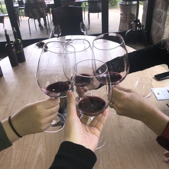 Moone-Tsai Wines - people toasting with wine glasses - Wine Tasting Room Near Me - Saint Helena, California