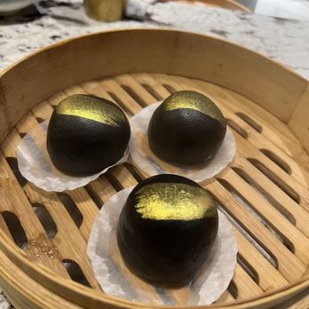 Supreme Dumplings Katy - Onyx Lava Custard Bun with Gold Flakes - Shanghainese Near Me - Katy, Texas Supreme Dumplings Katy - Onyx Lava Custard Bun with Gold Flakes - Shanghainese Near Me - Katy, Texas