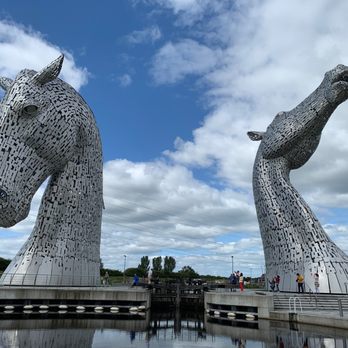 The Kelpies - Kelpies across the pool. - Cultural Center Near Me - Falkirk, FAL The Kelpies - Kelpies across the pool. - Cultural Center Near Me - Falkirk, FAL