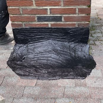Heavenly Construction - A chimney with new base flashing and counter flashing. - Roofing Near Me - Paterson, New Jersey