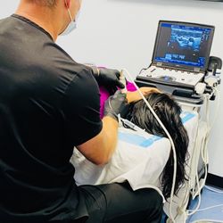 John How, MD - The How Clinic - Procedure in progress.