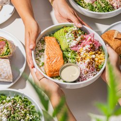 Pura Vida Miami - Avocado Salmon Bowl - nutritious protein-packed meal. Enjoy lunch or dinner with Pura Vida Miami