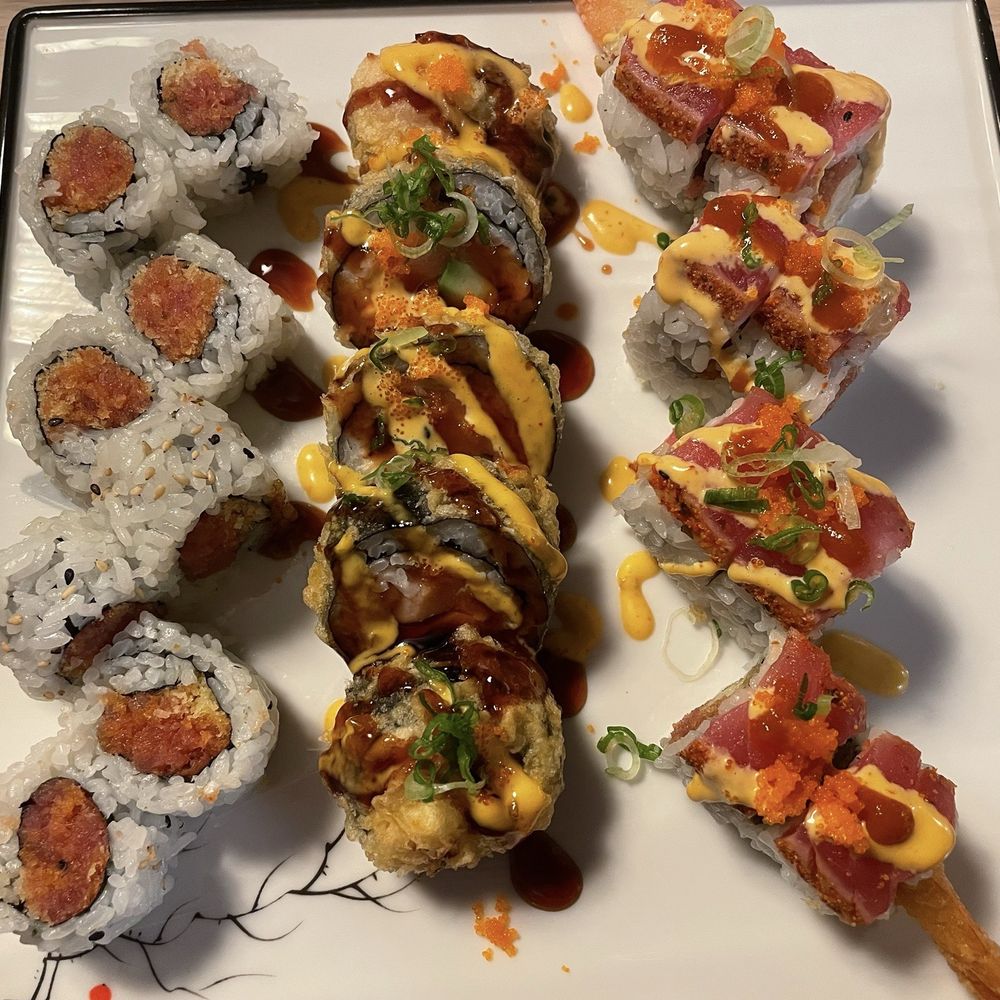 Sake - Round 1 - Delicious. (Left to right) Spicy tuna maki (with weird crunchy element?) Dynamite roll, and then Sake roll - Japanese Near Me - Chico, California Sake - Round 1 - Delicious. (Left to right) Spicy tuna maki (with weird crunchy element?) Dynamite roll, and then Sake roll - Japanese Near Me - Chico, California