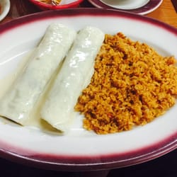 Ebin Ezers - Beef stew quesadillas, covered in a white cheese sauce. Spanish rice, very tasty dish.