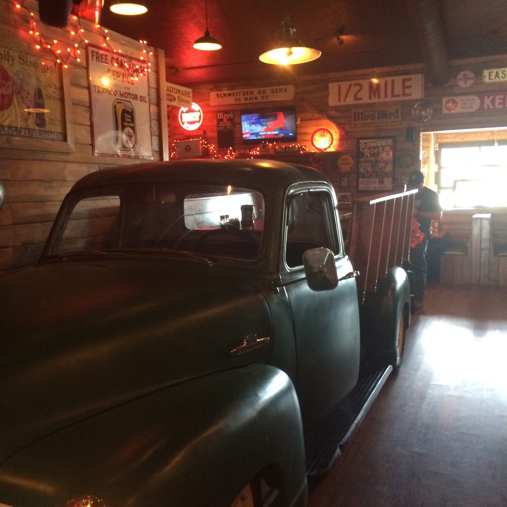 Sparky's Garage - 1950's pick up truck converted to dining table. - American Near Me - Dillon, Montana Sparky's Garage - 1950's pick up truck converted to dining table. - American Near Me - Dillon, Montana