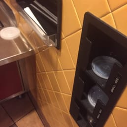 Lack of straws and lids next to Dinning room fountain.
