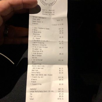 Katz's - Our receipt - you'll see the gratuity charges as well as the milk charges vs it being included with the kids meals. - Delis Near Me - Houston, Texas