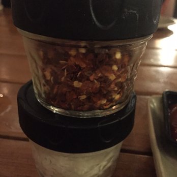 Monkeypod Kitchen - Chili flakes and Parmesan for pizza! - Hawaiian Near Me - Kapolei, Hawaii