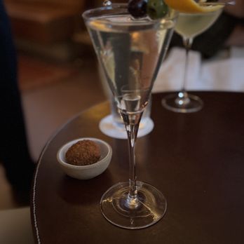March - March martini with side of fried olive - Mediterranean Near Me - Houston, Texas