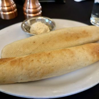 Bastien's - Breadsticks with garlic butter. - Steakhouses Near Me - Denver, Colorado