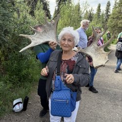 Gid Away Travel - A happy client in Alaska! Bucket List trip made her year!