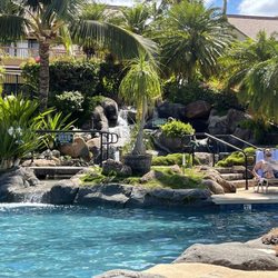 Maui Kamaole Accomodations - Sunning at the pool, beautiful waterfall