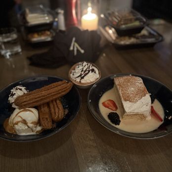 Caló Kitchen + Tequila - Our comp dessert with candles for the bday girl! - Cocktail Bars Near Me - Costa Mesa, California Caló Kitchen + Tequila - Our comp dessert with candles for the bday girl! - Cocktail Bars Near Me - Costa Mesa, California