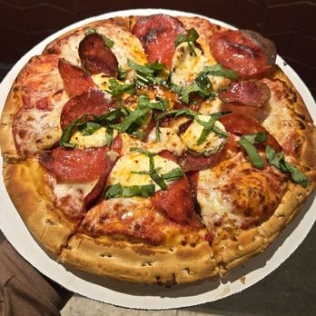 Pizza Deck - Half Dome pizza: mozzarella, pepperoni, salami, ricotta, basil, chili oil and honey drizzle - Pizza Near Me - Yosemite National Park, California Pizza Deck - Half Dome pizza: mozzarella, pepperoni, salami, ricotta, basil, chili oil and honey drizzle - Pizza Near Me - Yosemite National Park, California