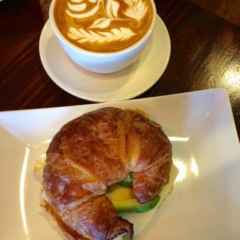 Cafein - Rose latte with the sausage on croissant breakfast sandwich, amazing! - Coffee & Tea Near Me - Chantilly, Virginia Cafein - Rose latte with the sausage on croissant breakfast sandwich, amazing! - Coffee & Tea Near Me - Chantilly, Virginia