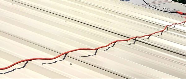 Clay Roofing And Construction Logo