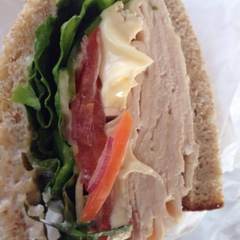 Panino - Roast Turkey with Sliced Brie - basil with mayo, honey mustard, organic greens, tomato, green bell pepper, red onion & cucumber - Sandwiches Near Me - Santa Barbara, California Panino - Roast Turkey with Sliced Brie - basil with mayo, honey mustard, organic greens, tomato, green bell pepper, red onion & cucumber - Sandwiches Near Me - Santa Barbara, California