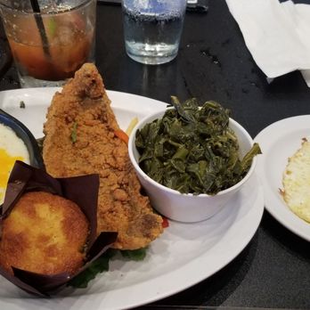 Grits and Eggs Breakfast Kitchen - Red Snapper and Grits with collard greens - Breakfast & Brunch Near Me - Atlanta, Georgia