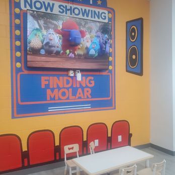Baker Pediatric Dental Care - Adorable children's table with massive TV for movies - Pediatric Dentists Near Me - Menifee, California Baker Pediatric Dental Care - Adorable children's table with massive TV for movies - Pediatric Dentists Near Me - Menifee, California
