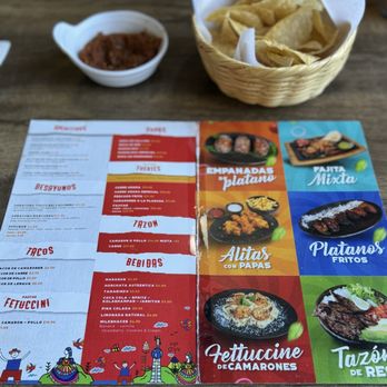 Casa Dora - Menu and some chips with salsa. - Salvadoran Near Me - Hyattsville, Maryland