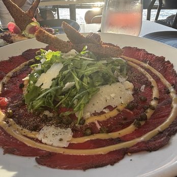 Honu Oceanside - Filet Mignon Carpaccio with Grilled Spanish Octopus is the back - Seafood Near Me - Lahaina, Hawaii Honu Oceanside - Filet Mignon Carpaccio with Grilled Spanish Octopus is the back - Seafood Near Me - Lahaina, Hawaii