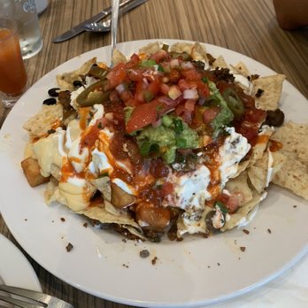 Wild Eggs - These Kitchen Sink Nachos are huge and delicious! - Breakfast & Brunch Near Me - Cincinnati, Ohio Wild Eggs - These Kitchen Sink Nachos are huge and delicious! - Breakfast & Brunch Near Me - Cincinnati, Ohio