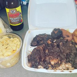 Winston's West Indian and American Resturant - Oxtail Platter, Mac n Cheese and Jamaican soda.