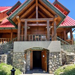 The Outpost - The charming exterior of The outpost pub