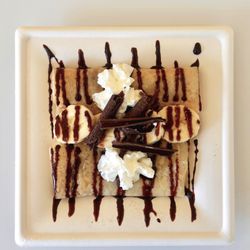 Always Summer Cafe - BANANA CHOCOLATE CREPE A warm, delicate crepe filled with fresh banana slices and melted chocolate/Nutella.