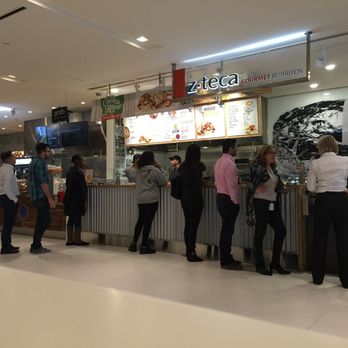 Z-Teca - a group of people standing in line - Mexican Near Me - Guelph, Ontario