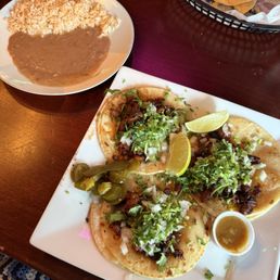 Al pastor tacos with rice and beans Al pastor tacos with rice and beans