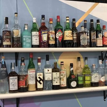 Native Son - Wall decor of liquor - Cocktail Bars Near Me - Rancho Cucamonga, California Native Son - Wall decor of liquor - Cocktail Bars Near Me - Rancho Cucamonga, California
