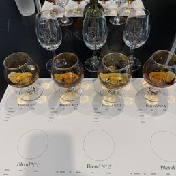 Bourbon samples on a placemat ready for blending experience. Bourbon samples on a placemat ready for blending experience.