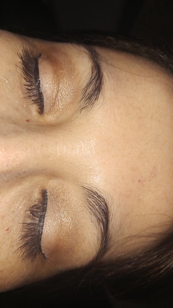 Unique Boutique and Eye Designs Logo