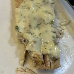 Boston Pizza - Grilled chicken with dill sauce on it.