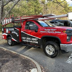 Doors & More - Picking up the new truck from lettering shop