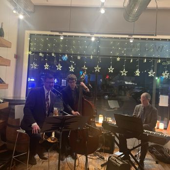 Cuvee Cellars - two men playing instruments in a wine shop - Wine Bars Near Me - Elmhurst, Illinois