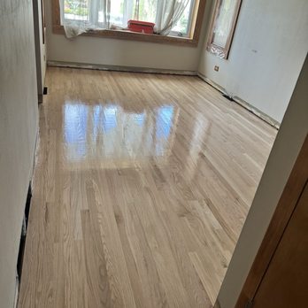 Special Floor - After, new living room floor install. - Refinishing Services Near Me