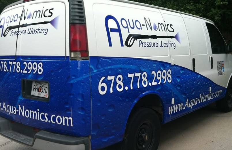 Slide of Aqua-Nomics Pressure Washing and Roof Cleaning