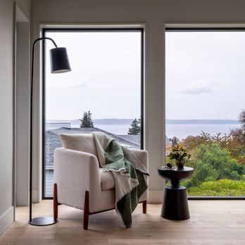 Tristan Gary Designs - Large windows to capture the views of the puget sound from this primary bedroom that feels like your in the clouds. - Interior Design Near Me Tristan Gary Designs - Large windows to capture the views of the puget sound from this primary bedroom that feels like your in the clouds. - Interior Design Near Me