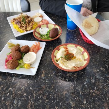 Beirut Cafe - At 2 o'clock: flatbread 5 o'clock: hummus 7 o'clock: falafel 10 o'clock: foul mudammas Center: Fried Kibbeh - Lebanese Near Me - Murray, Utah Beirut Cafe - At 2 o'clock: flatbread 5 o'clock: hummus 7 o'clock: falafel 10 o'clock: foul mudammas Center: Fried Kibbeh - Lebanese Near Me - Murray, Utah
