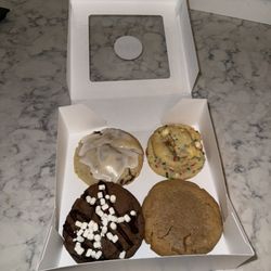 JoJo’s Cookie - Cinnamon roll, birthday cake, hot chocolate, and peanut butter cookies!