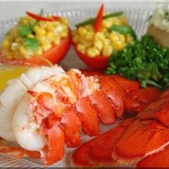 Atlantic Seafood - lobster, corn, and potatoes on a plate - Seafood Near Me - Old Saybrook, Connecticut Atlantic Seafood - lobster, corn, and potatoes on a plate - Seafood Near Me - Old Saybrook, Connecticut