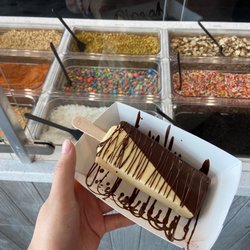 The Paleta Bar - Toppings. banana pop with dark chocolate