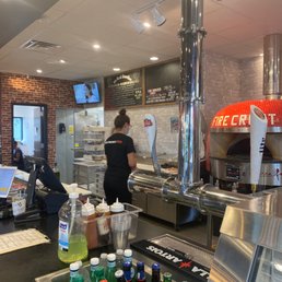 a man preparing food in a restaurant