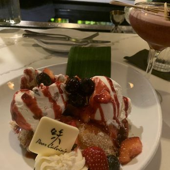 Poor Calvin's - Peach empanadas with goat cheese and Bourbon Butter Pecan ice cream! - Asian Fusion Near Me - Atlanta, Georgia