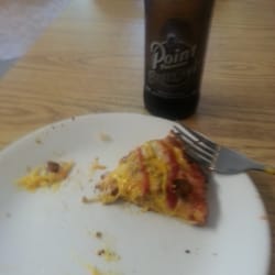 Man Made - Remnants of a cheeseburger pizza ...