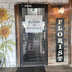 The Garden Exchange - Entrance. Store hours.