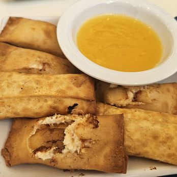 Ho Sum Bistro - Crispy Crab Bellies (aka crab rangoon). Average. - Dim Sum Near Me - Newport Beach, California Ho Sum Bistro - Crispy Crab Bellies (aka crab rangoon). Average. - Dim Sum Near Me - Newport Beach, California